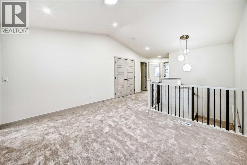 31 Lucas Passage Nw, Calgary, AB - Indoor Photo Showing Other Room