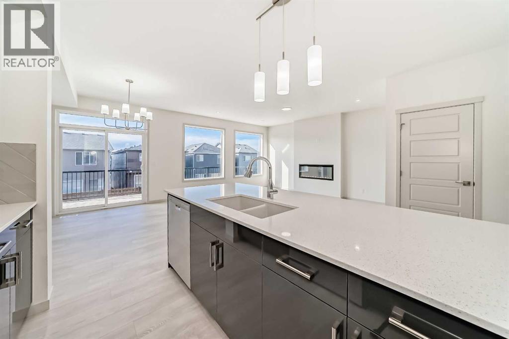 31 Lucas Passage Nw, Calgary, AB - Indoor Photo Showing Kitchen With Double Sink With Upgraded Kitchen