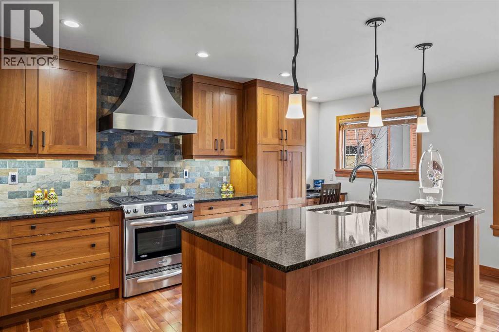 7 Creekside Mews, Canmore, AB - Indoor Photo Showing Kitchen With Double Sink With Upgraded Kitchen