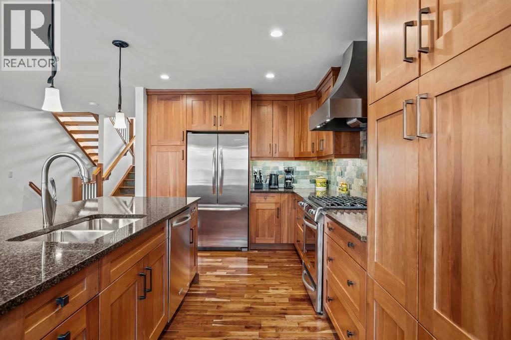 7 Creekside Mews, Canmore, AB - Indoor Photo Showing Kitchen With Double Sink With Upgraded Kitchen