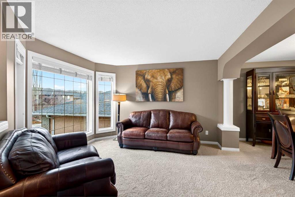 69 Elkton Way Sw, Calgary, AB - Indoor Photo Showing Living Room