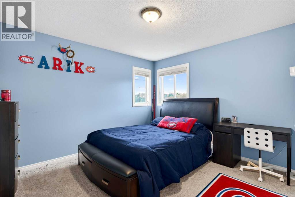 69 Elkton Way Sw, Calgary, AB - Indoor Photo Showing Bedroom
