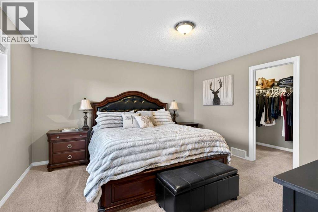 69 Elkton Way Sw, Calgary, AB - Indoor Photo Showing Bedroom
