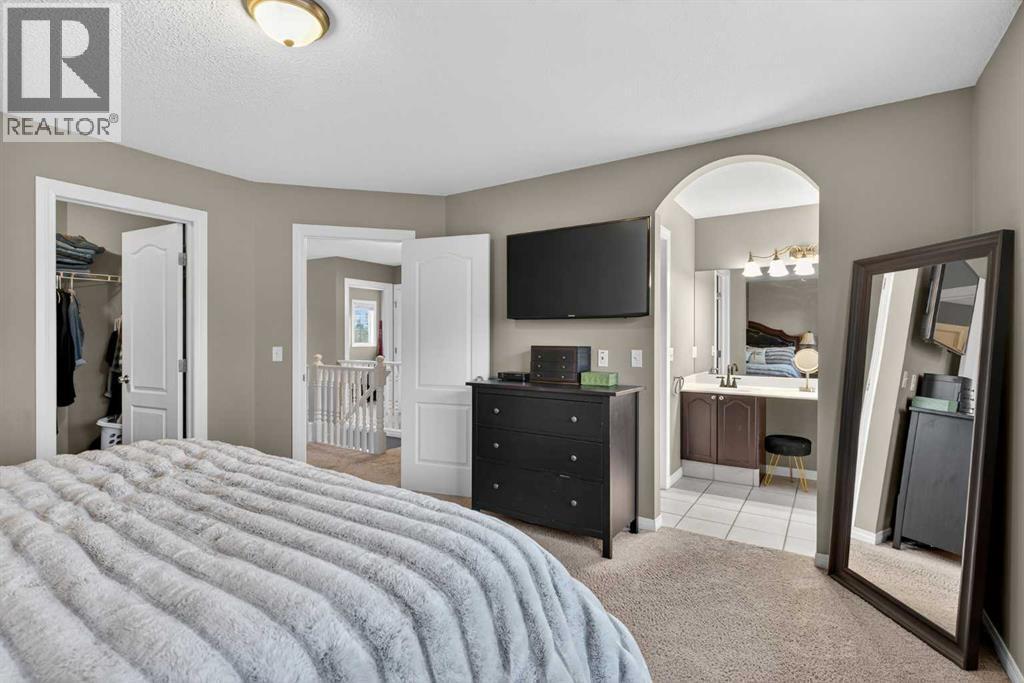 69 Elkton Way Sw, Calgary, AB - Indoor Photo Showing Bedroom