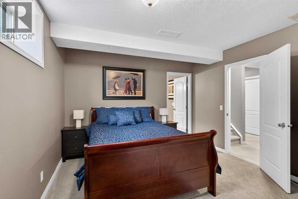 69 Elkton Way Sw, Calgary, AB - Indoor Photo Showing Bedroom