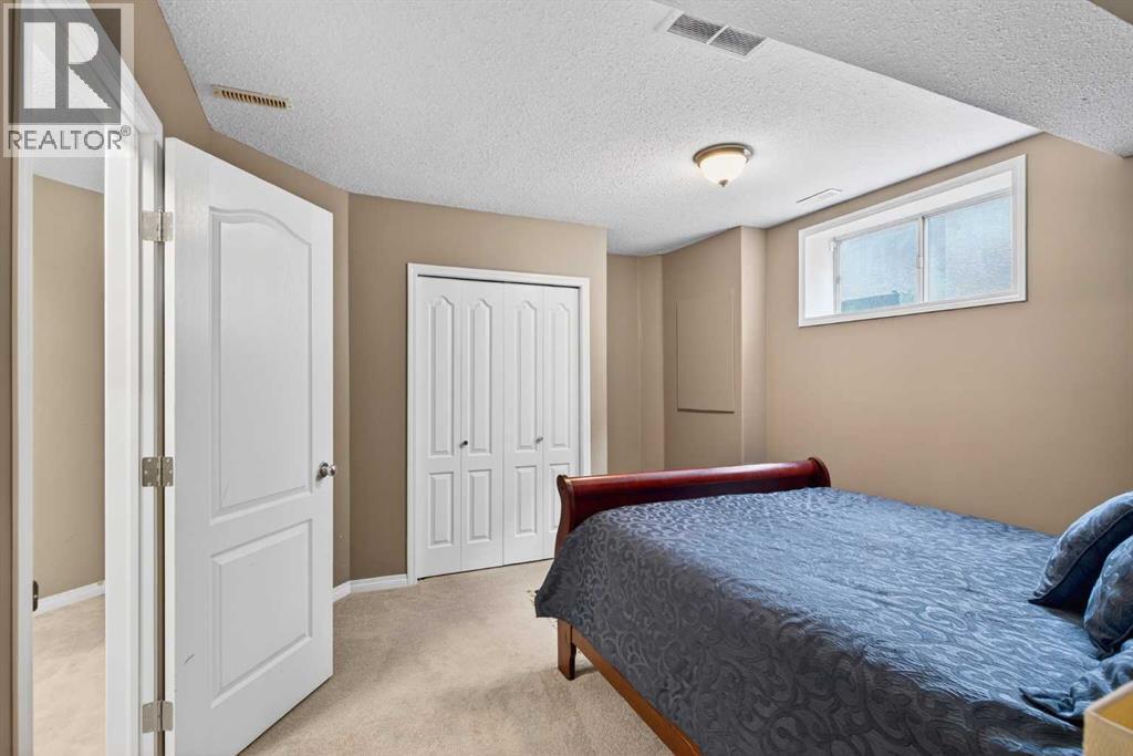 69 Elkton Way Sw, Calgary, AB - Indoor Photo Showing Bedroom