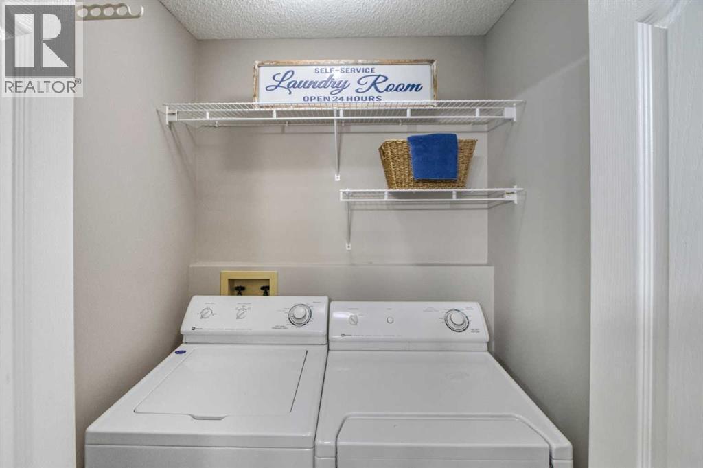 134 Hamptons Heath Nw, Calgary, AB - Indoor Photo Showing Laundry Room