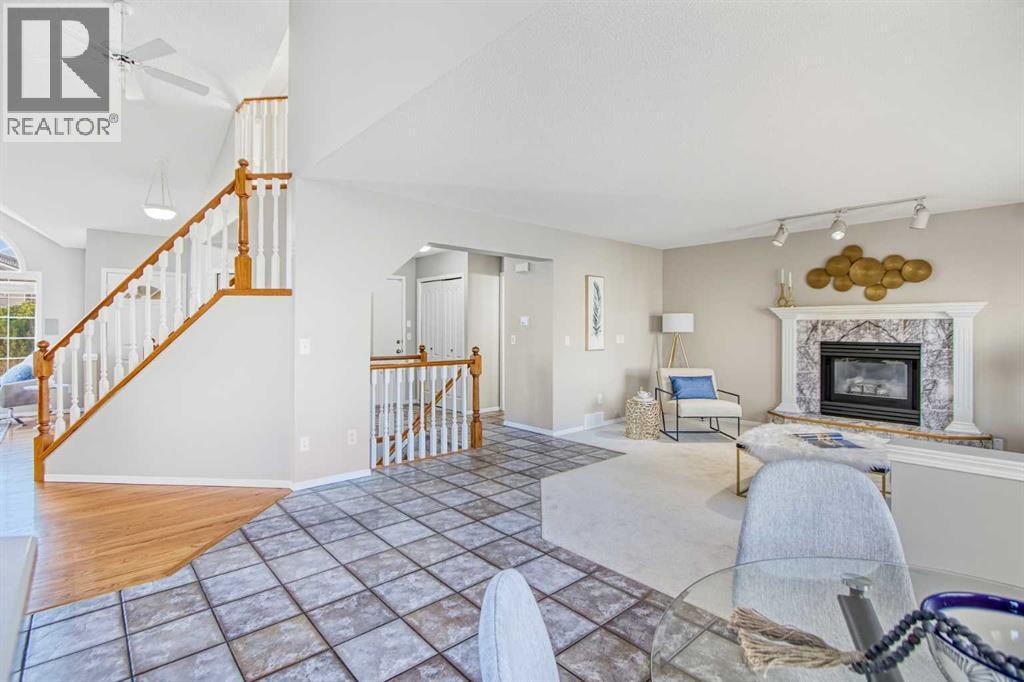 134 Hamptons Heath Nw, Calgary, AB - Indoor With Fireplace