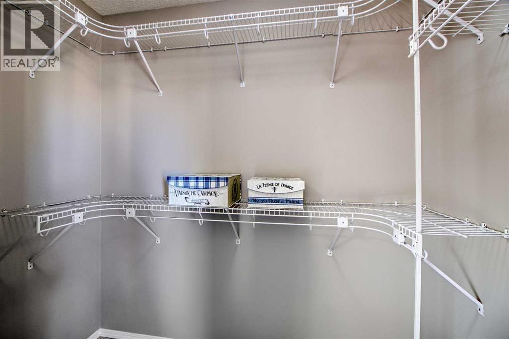 134 Hamptons Heath Nw, Calgary, AB - Indoor With Storage