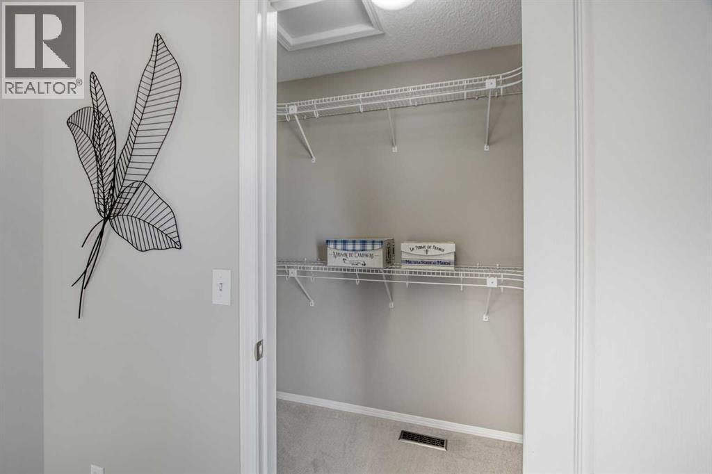 134 Hamptons Heath Nw, Calgary, AB - Indoor With Storage