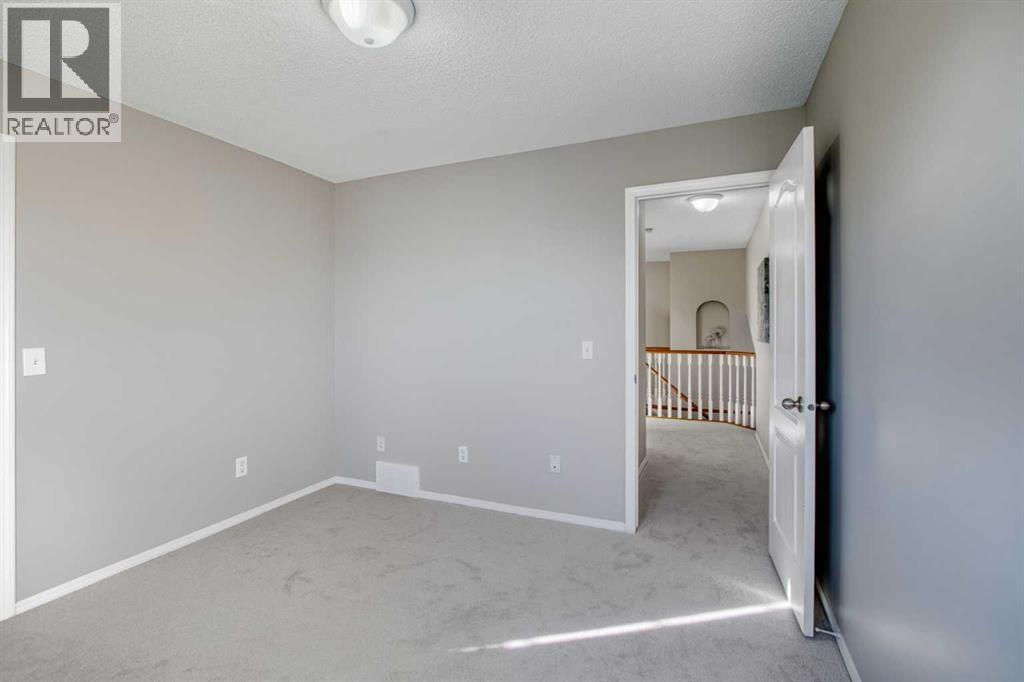 134 Hamptons Heath Nw, Calgary, AB - Indoor Photo Showing Other Room