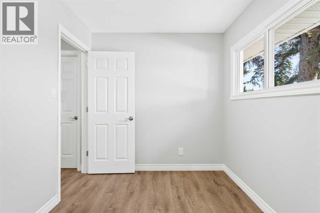 Bedroom 2 - 321 Haddon Road Sw, Calgary, AB - Indoor Photo Showing Other Room