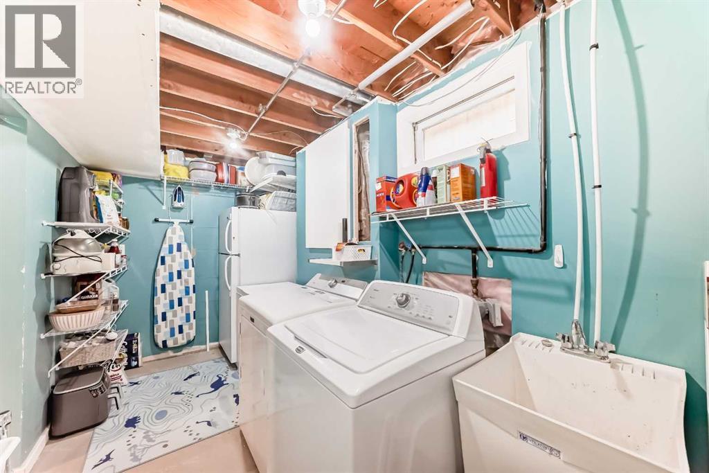 laundry on lower - 12 Taraglen Road Ne, Calgary, AB - Indoor Photo Showing Laundry Room