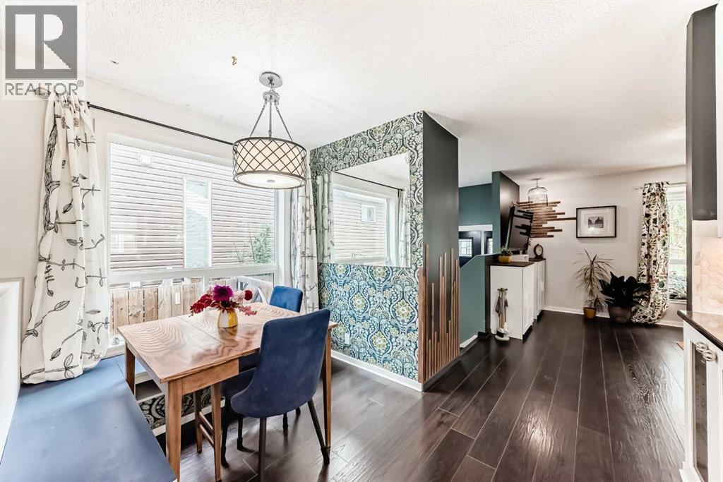 dining room with bench seating - 12 Taraglen Road Ne, Calgary, AB - Indoor Photo Showing Dining Room