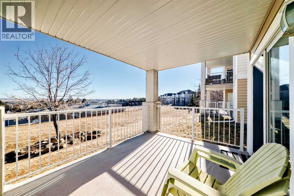 111, 6900 Hunterview Drive Nw, Calgary, AB - Outdoor With Deck Patio Veranda With Exterior