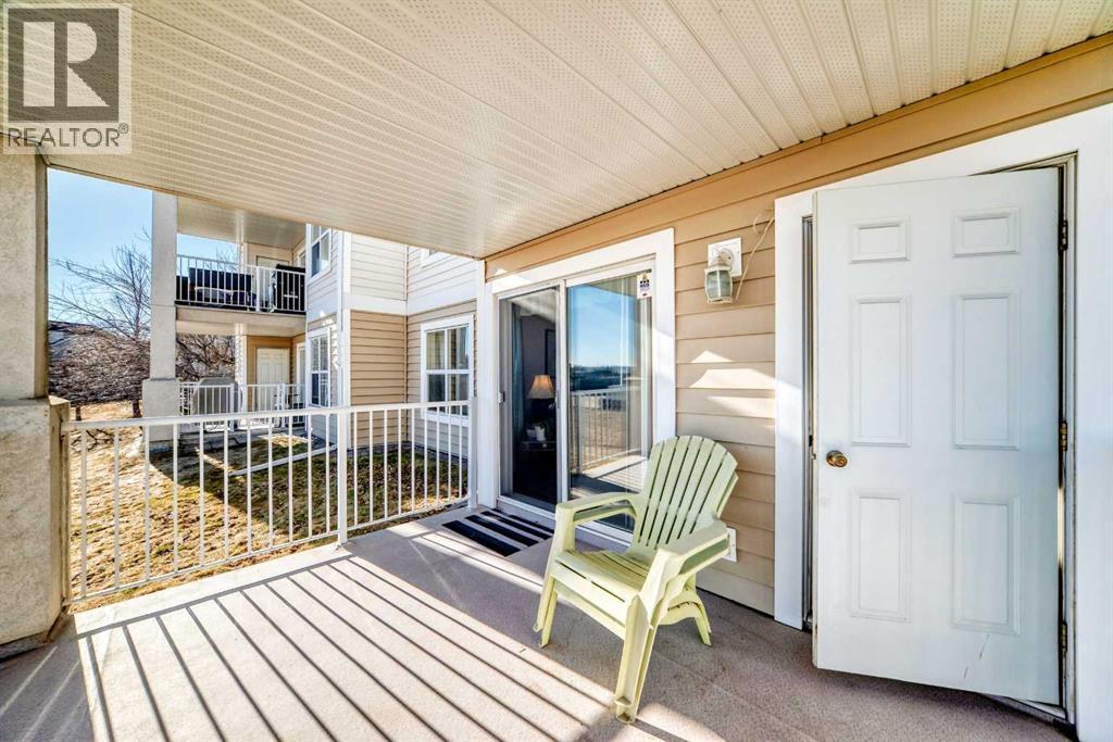 111, 6900 Hunterview Drive Nw, Calgary, AB - Outdoor With Deck Patio Veranda With Exterior