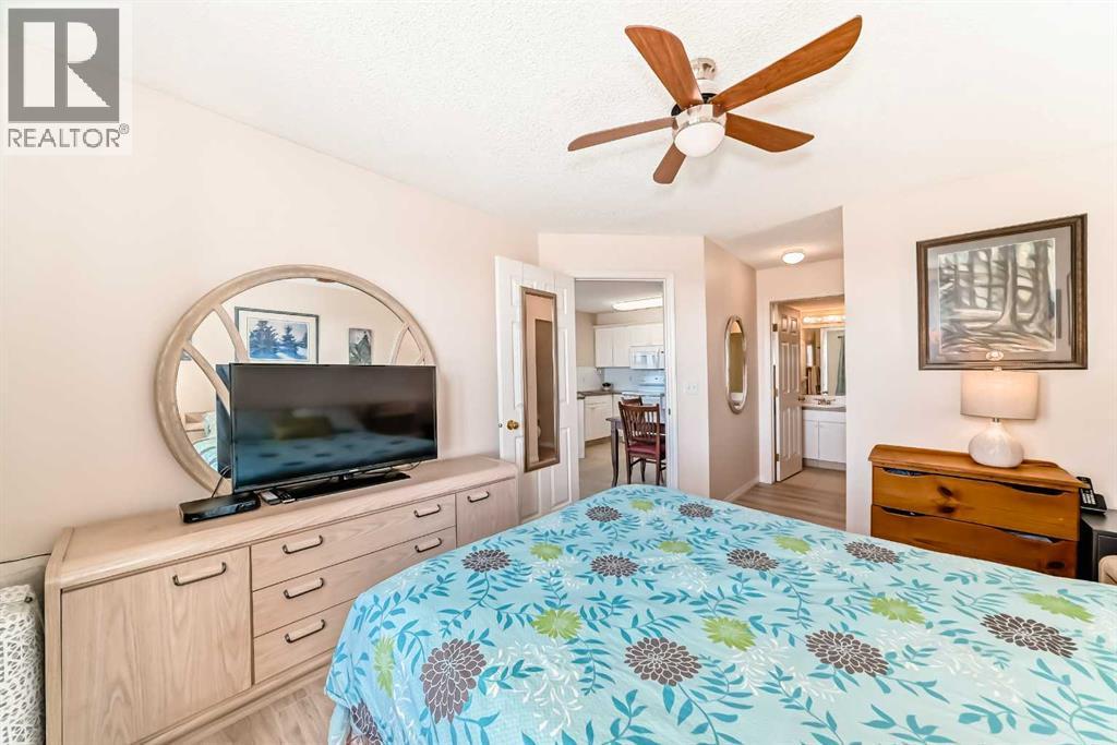 111, 6900 Hunterview Drive Nw, Calgary, AB - Indoor Photo Showing Bedroom