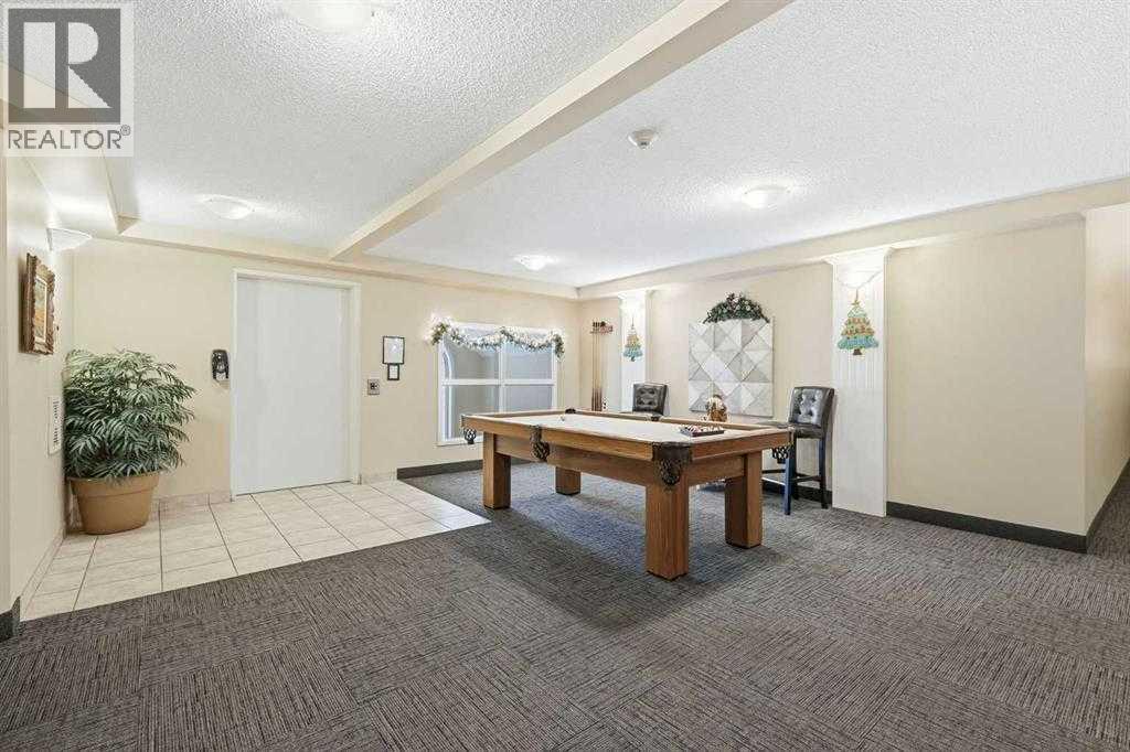 111, 6900 Hunterview Drive Nw, Calgary, AB - Indoor Photo Showing Other Room