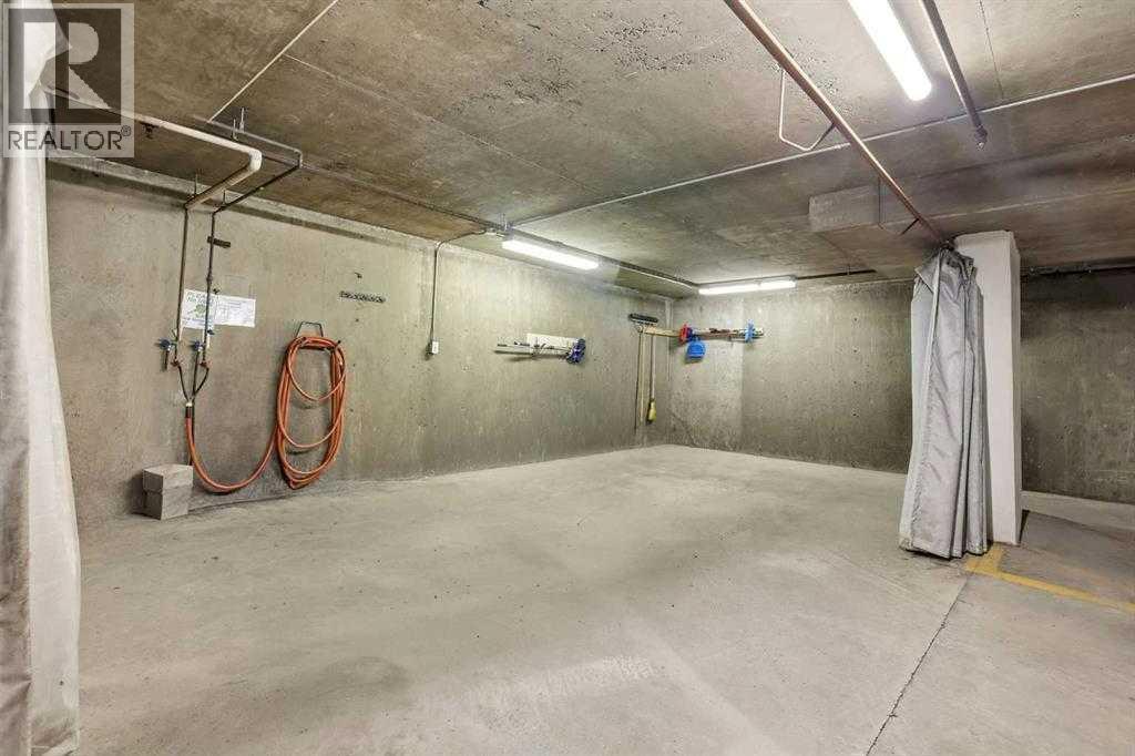 111, 6900 Hunterview Drive Nw, Calgary, AB - Indoor Photo Showing Garage