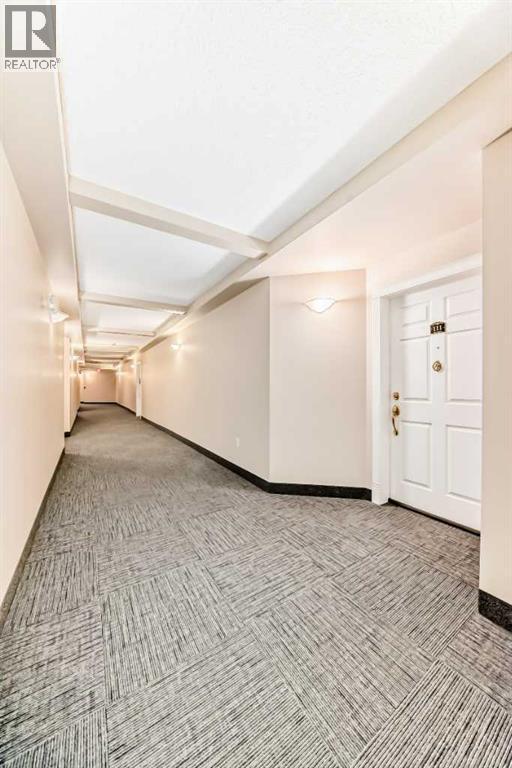 111, 6900 Hunterview Drive Nw, Calgary, AB - Indoor Photo Showing Other Room