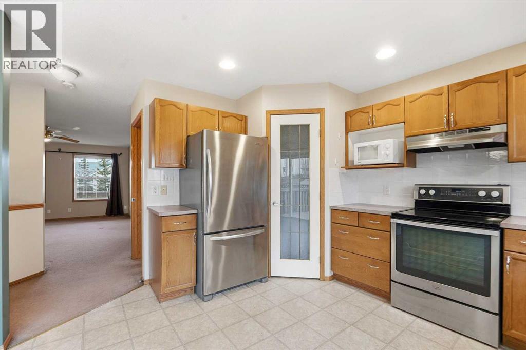 905 Arbour Lake Road Nw, Calgary, AB - Indoor Photo Showing Kitchen With Stainless Steel Kitchen