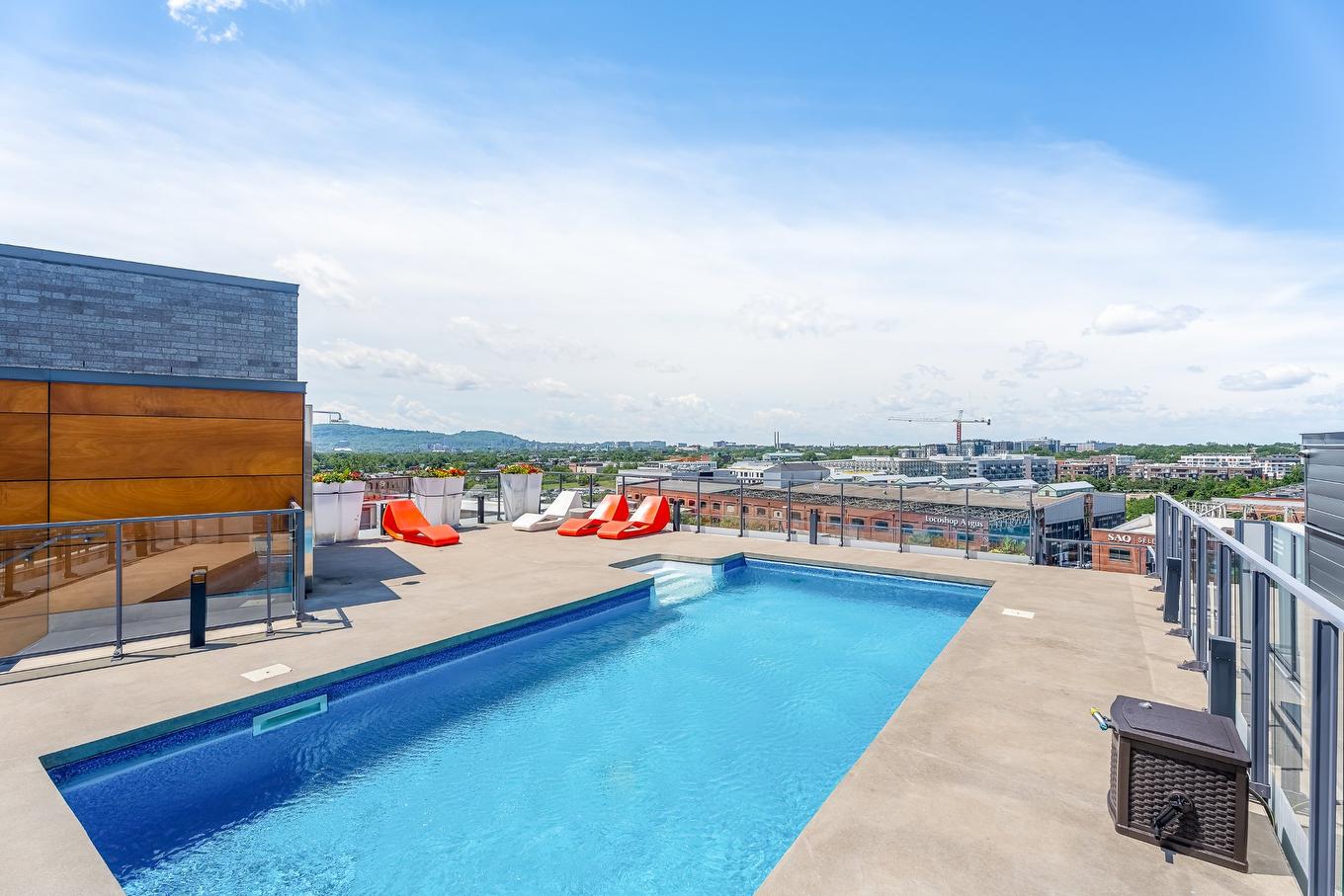 Piscine - 401-3900 Rue Marcel-Pepin, Montréal (Rosemont/La Petite-Patrie), QC - Outdoor With In Ground Pool With View