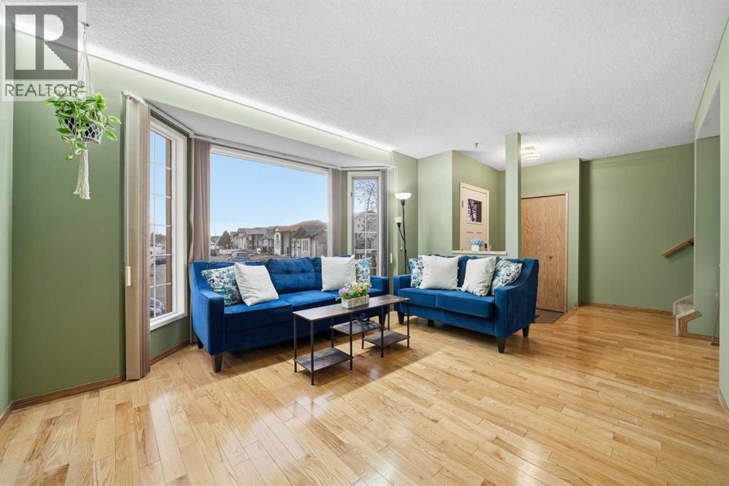 24 Laguna Close Ne, Calgary, AB - Indoor Photo Showing Living Room