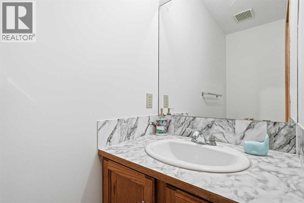 24 Laguna Close Ne, Calgary, AB - Indoor Photo Showing Bathroom