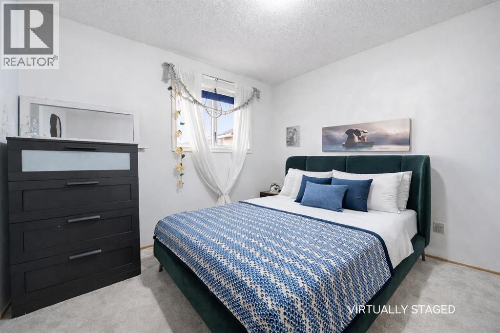 VIRTUAL IMAGE - 24 Laguna Close Ne, Calgary, AB - Indoor Photo Showing Bedroom