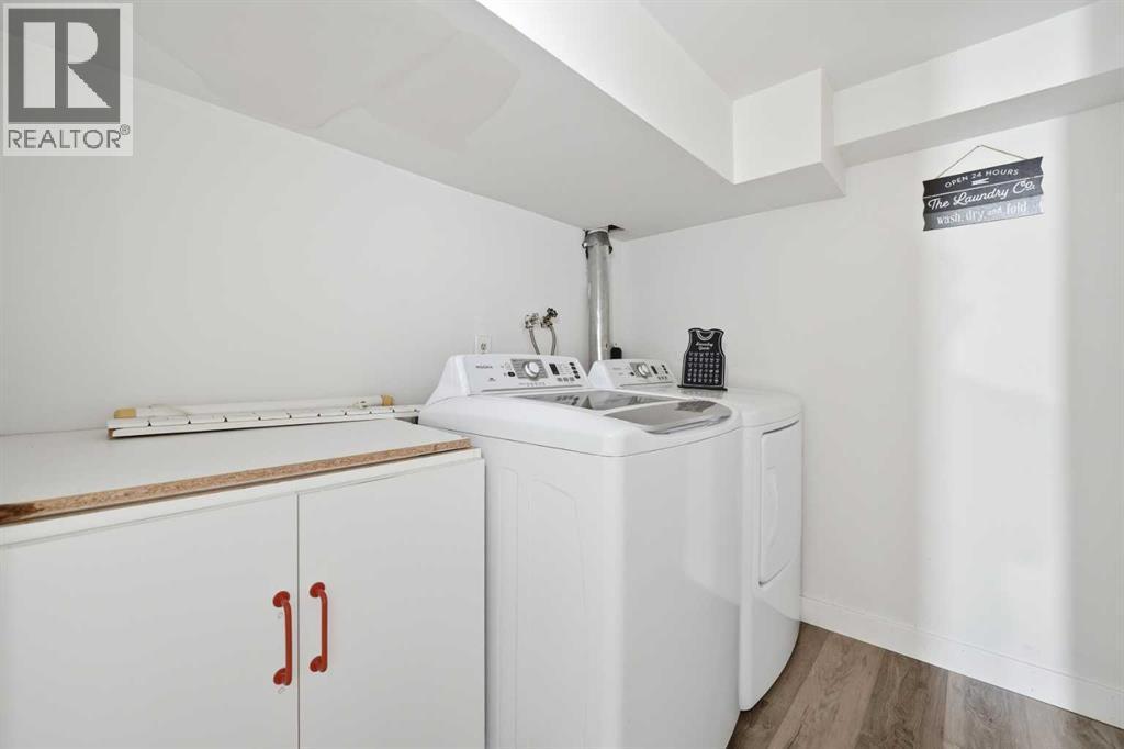 24 Laguna Close Ne, Calgary, AB - Indoor Photo Showing Laundry Room