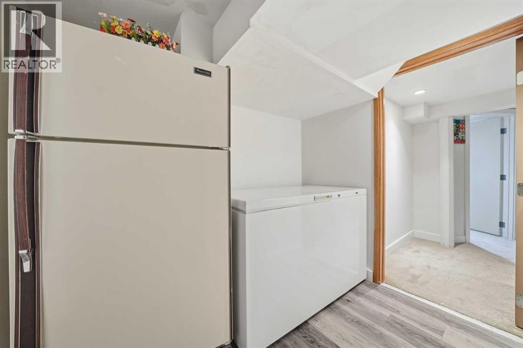 24 Laguna Close Ne, Calgary, AB - Indoor Photo Showing Laundry Room