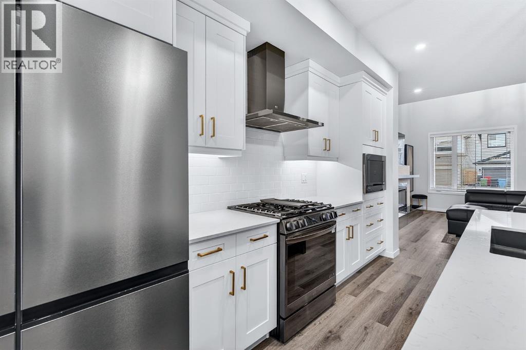 413 Belmont Park Sw, Calgary, AB - Indoor Photo Showing Kitchen With Upgraded Kitchen