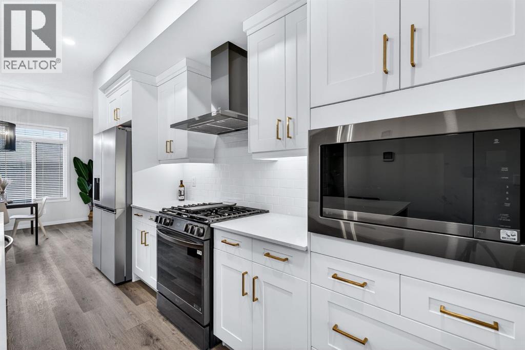 413 Belmont Park Sw, Calgary, AB - Indoor Photo Showing Kitchen With Stainless Steel Kitchen With Upgraded Kitchen