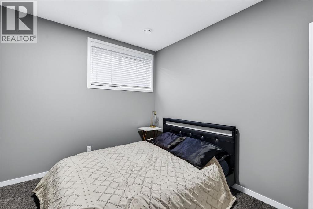 413 Belmont Park Sw, Calgary, AB - Indoor Photo Showing Bedroom