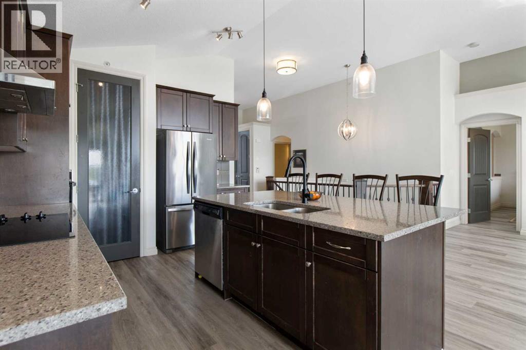11 Muirfield Close, Lyalta, AB - Indoor Photo Showing Kitchen With Double Sink With Upgraded Kitchen