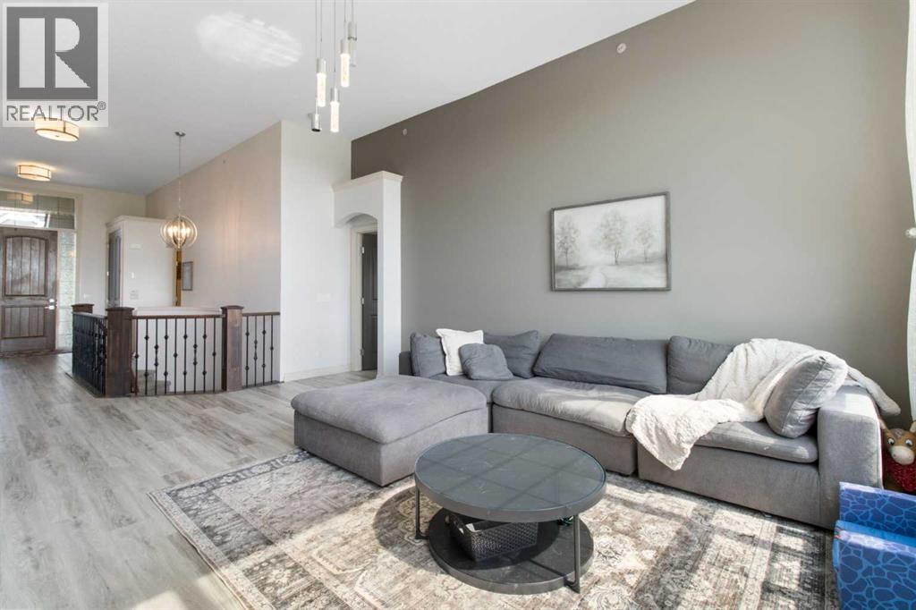 11 Muirfield Close, Lyalta, AB - Indoor Photo Showing Living Room