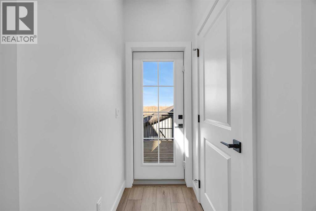 26 Versant Path Sw, Calgary, AB - Indoor Photo Showing Other Room