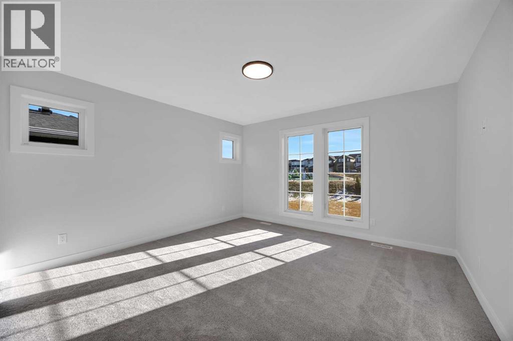 26 Versant Path Sw, Calgary, AB - Indoor Photo Showing Other Room