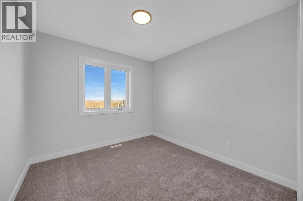 26 Versant Path Sw, Calgary, AB - Indoor Photo Showing Other Room