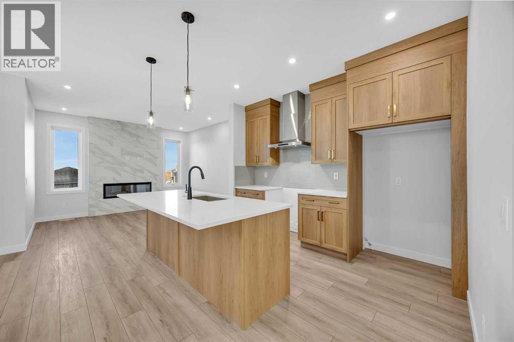 26 Versant Path Sw, Calgary, AB - Indoor Photo Showing Kitchen With Upgraded Kitchen