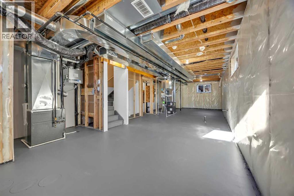 26 Versant Path Sw, Calgary, AB - Indoor Photo Showing Basement