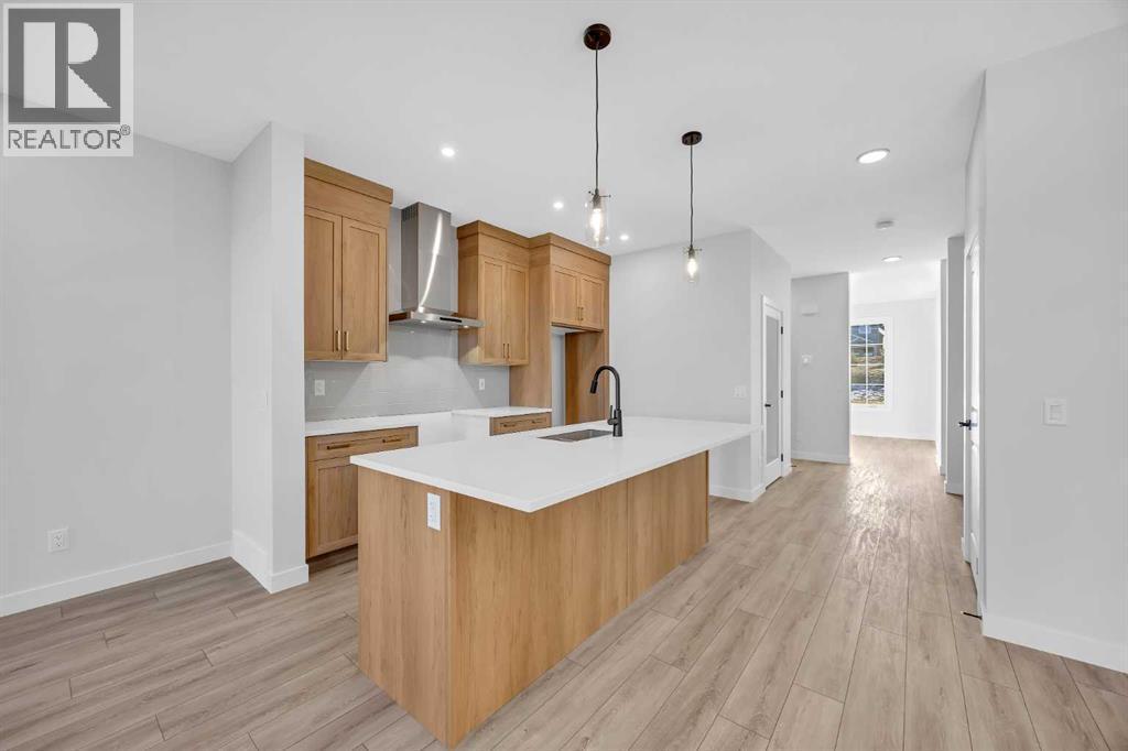 26 Versant Path Sw, Calgary, AB - Indoor Photo Showing Kitchen With Upgraded Kitchen