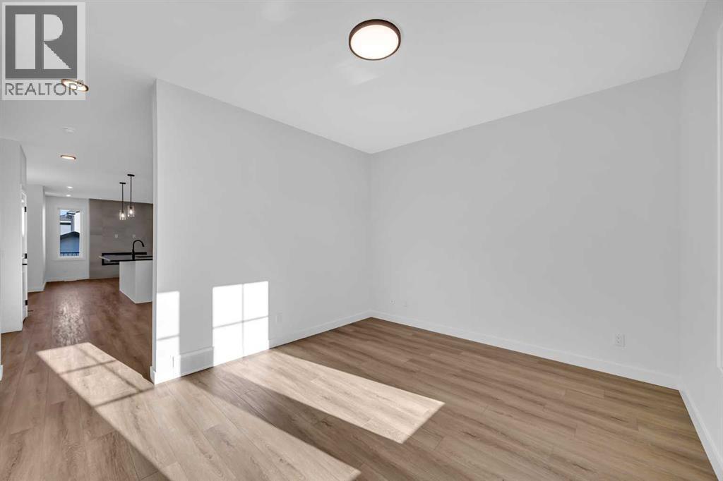 14 Versant Path Sw, Calgary, AB - Indoor Photo Showing Other Room