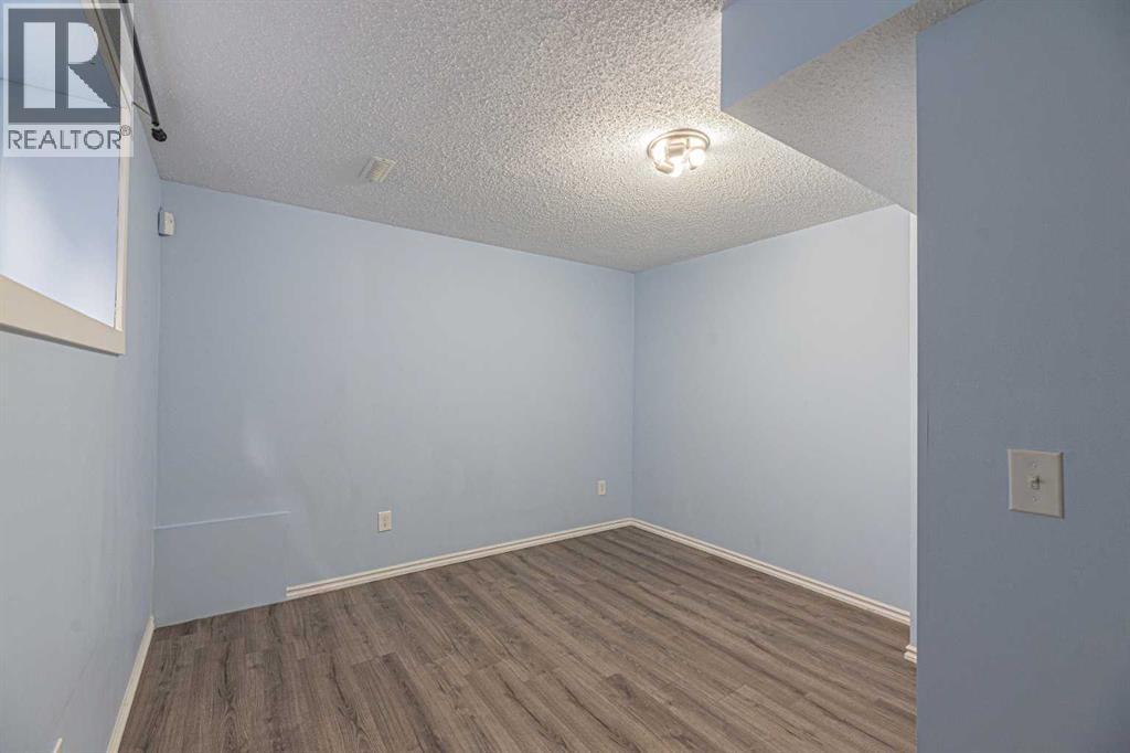 427 Saddlebrook Way Ne, Calgary, AB - Indoor Photo Showing Other Room