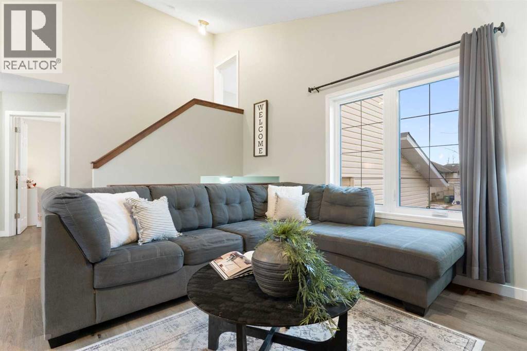 20 Willow Brook Crescent Nw, Airdrie, AB - Indoor Photo Showing Living Room