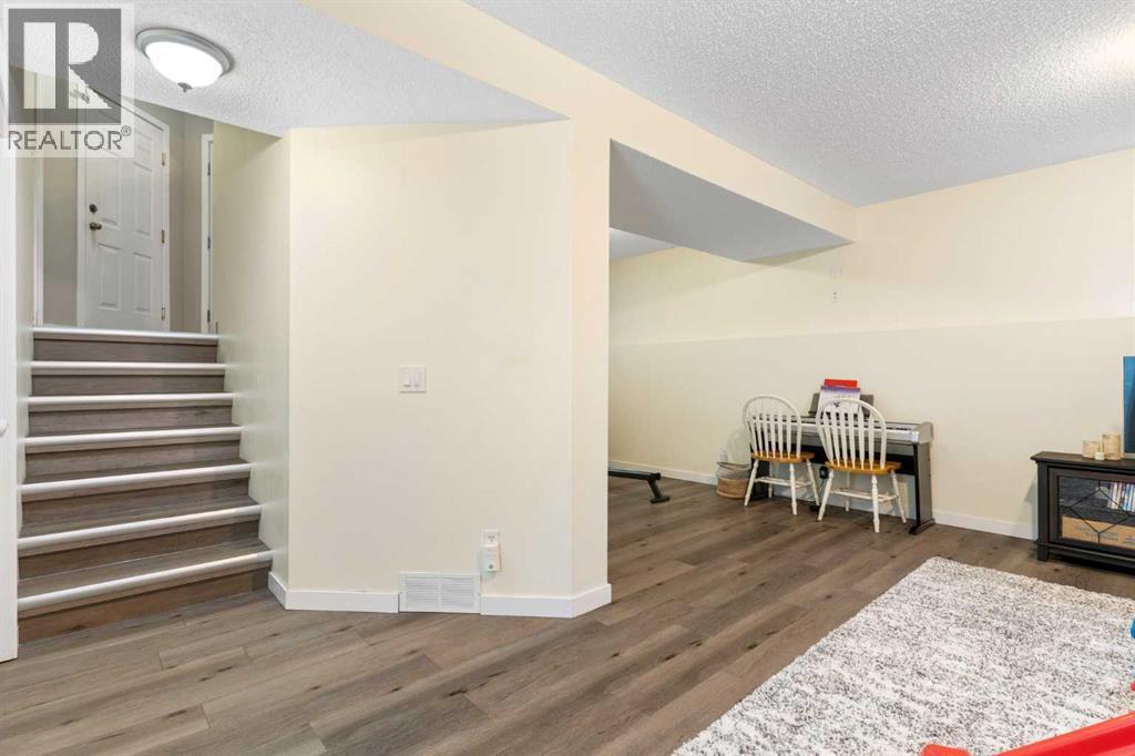 20 Willow Brook Crescent Nw, Airdrie, AB - Indoor Photo Showing Other Room