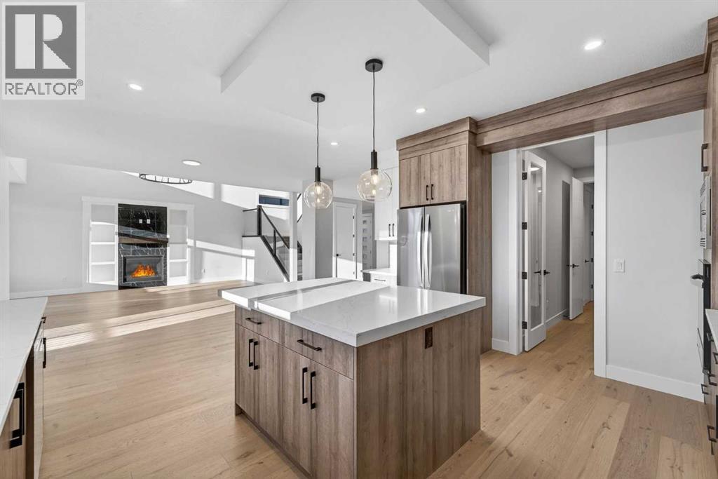 202 Kinniburgh Loop, Chestermere, AB - Indoor Photo Showing Kitchen With Upgraded Kitchen