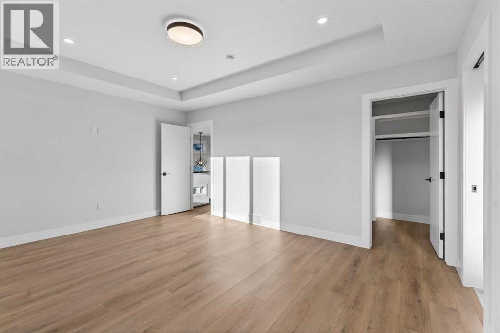 202 Kinniburgh Loop, Chestermere, AB - Indoor Photo Showing Other Room