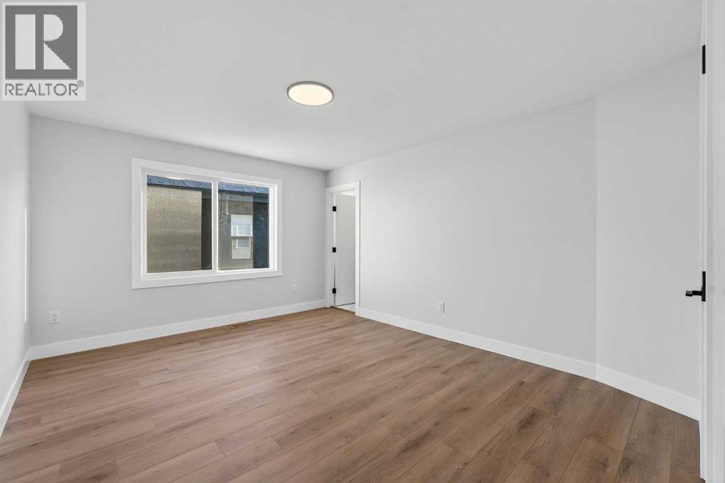 202 Kinniburgh Loop, Chestermere, AB - Indoor Photo Showing Other Room