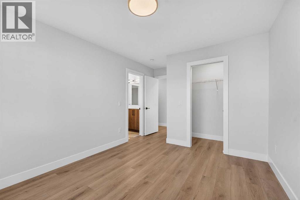 202 Kinniburgh Loop, Chestermere, AB - Indoor Photo Showing Other Room